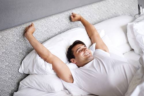 Mature man feeling rested and confident, representing prostate health support